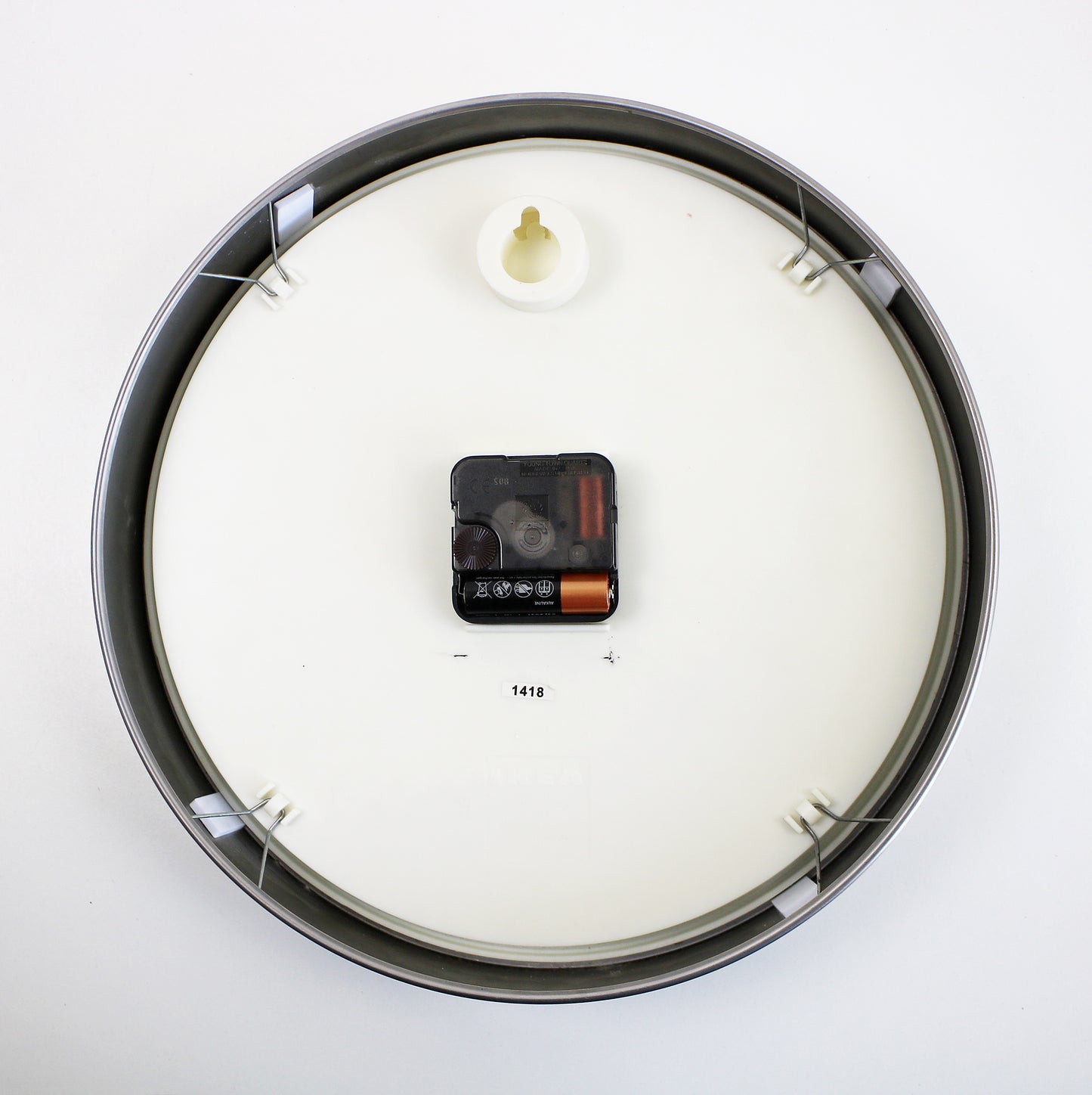 Preloved minimalist wall clock by IKEA space age yellow, black and steel