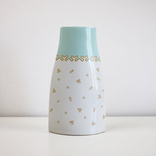 Ellipse shaped Zandra Rhodes vase for Royal Albert. My favourite things design with gold scrolls and blue border