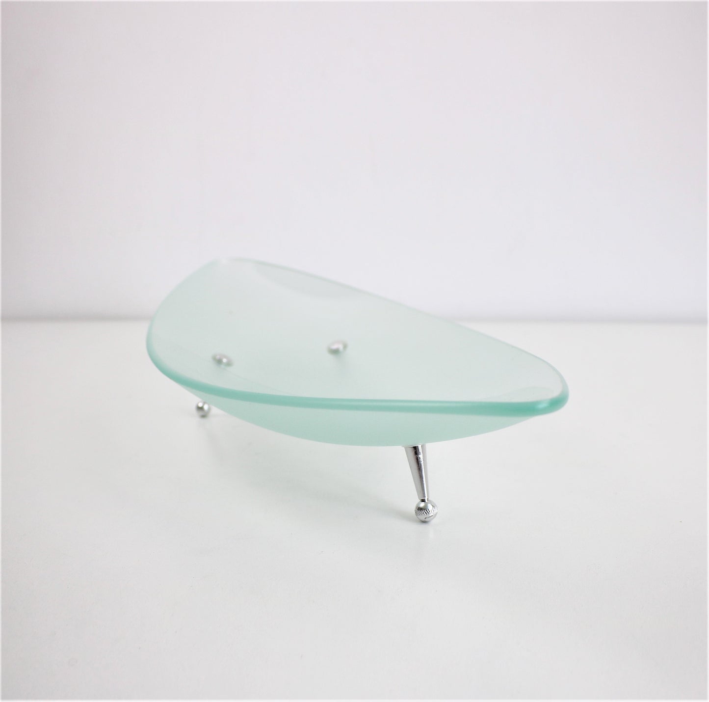 early 2000s elliptical frosted glass fruit bowl dish with metal atomic feet