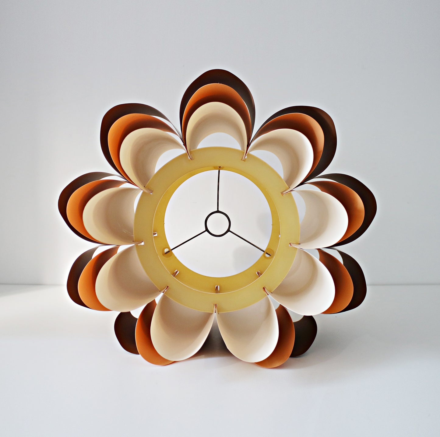 Rare 1970s ceiling lamp shade in (Hoyrup) tones of orange, brown and cream. Geometric modernist design in plastic