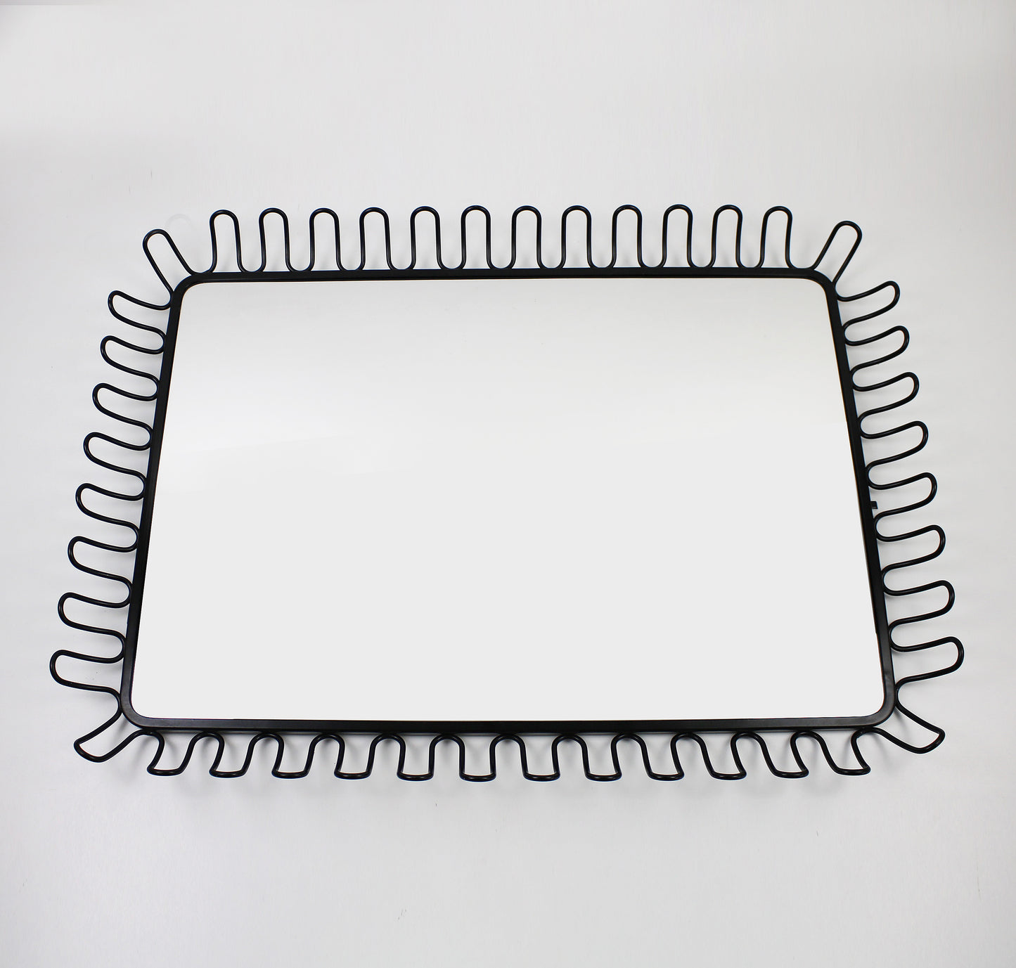 Preloved and retired Mandal mirror designed by Francis Cayouette for IKEA 2008