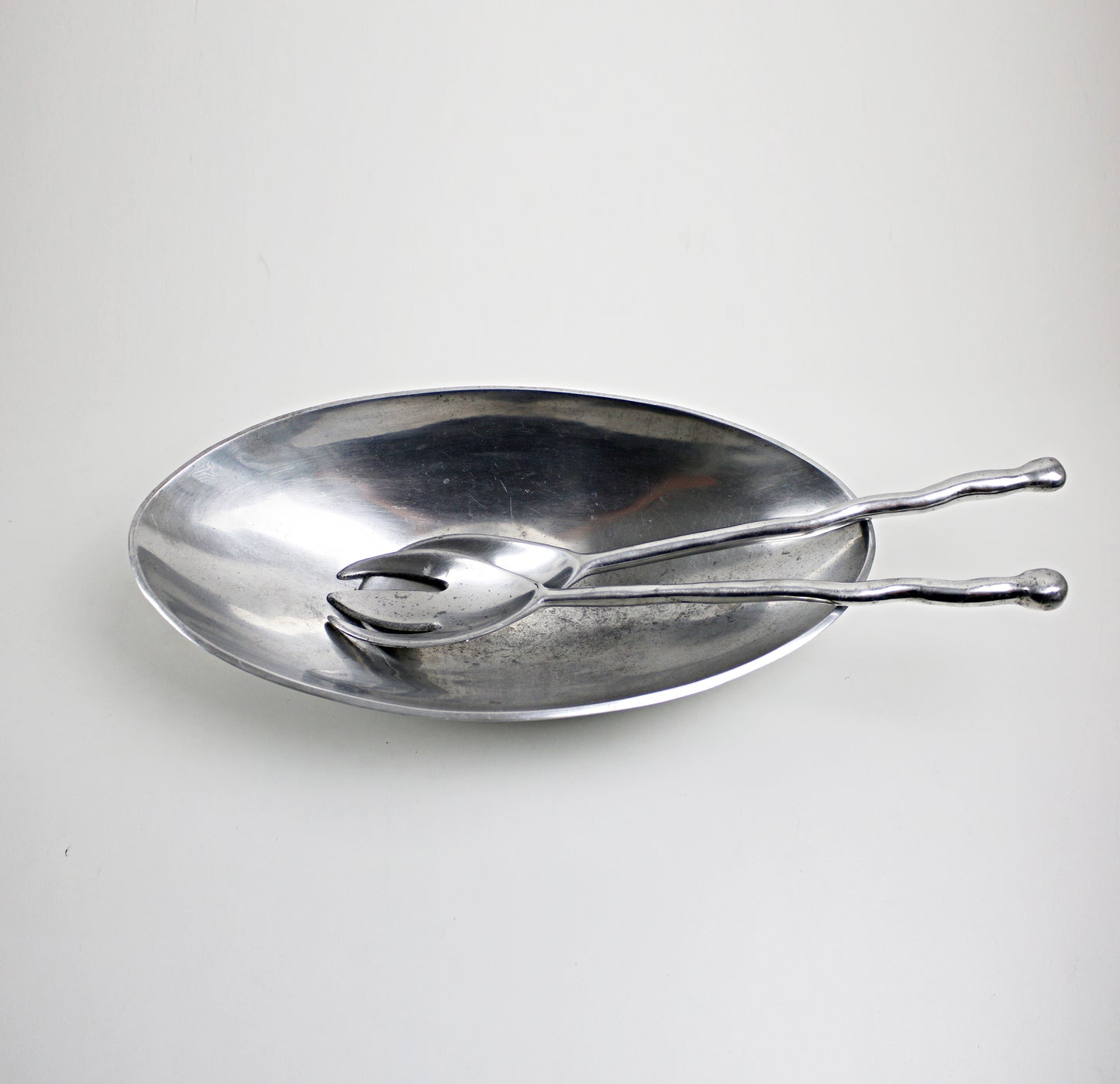 1990s Valerie Graham postmodern salad bowl and servers set in alumnium