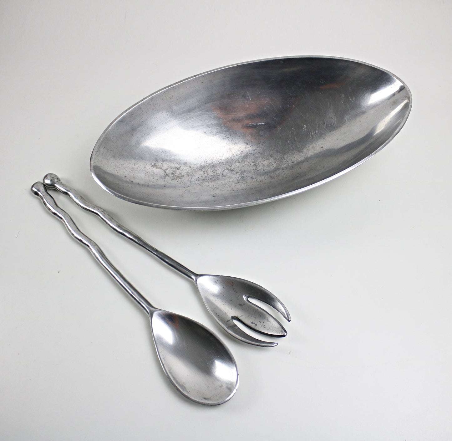 1990s Valerie Graham postmodern salad bowl and servers set in alumnium