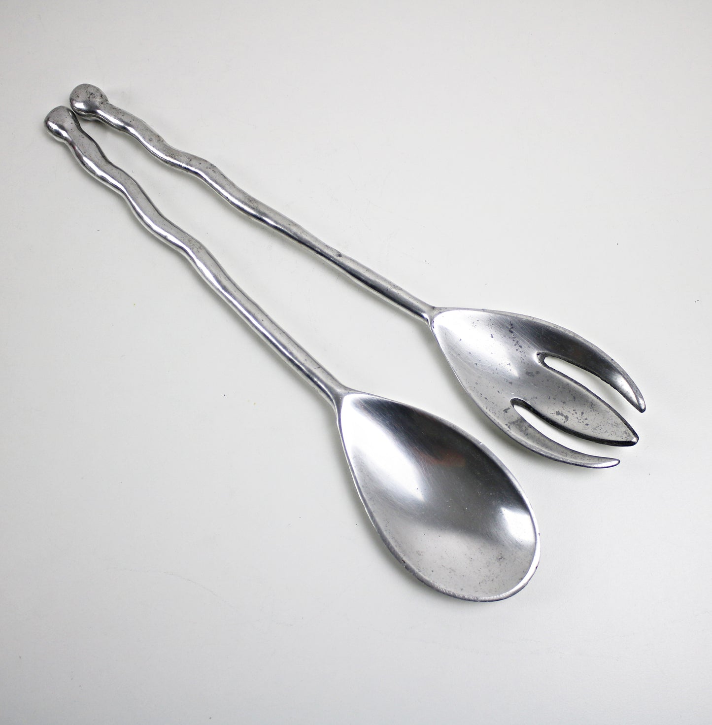 1990s Valerie Graham postmodern salad bowl and servers set in alumnium