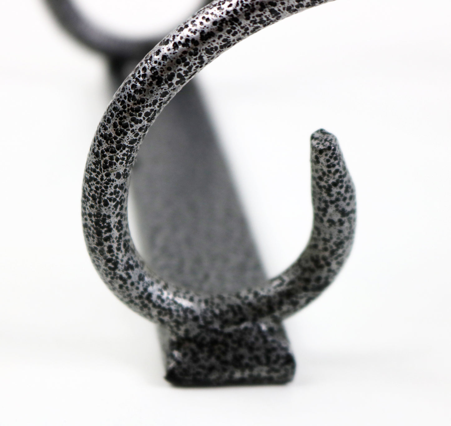 Grey and black scroll design iron wine rack