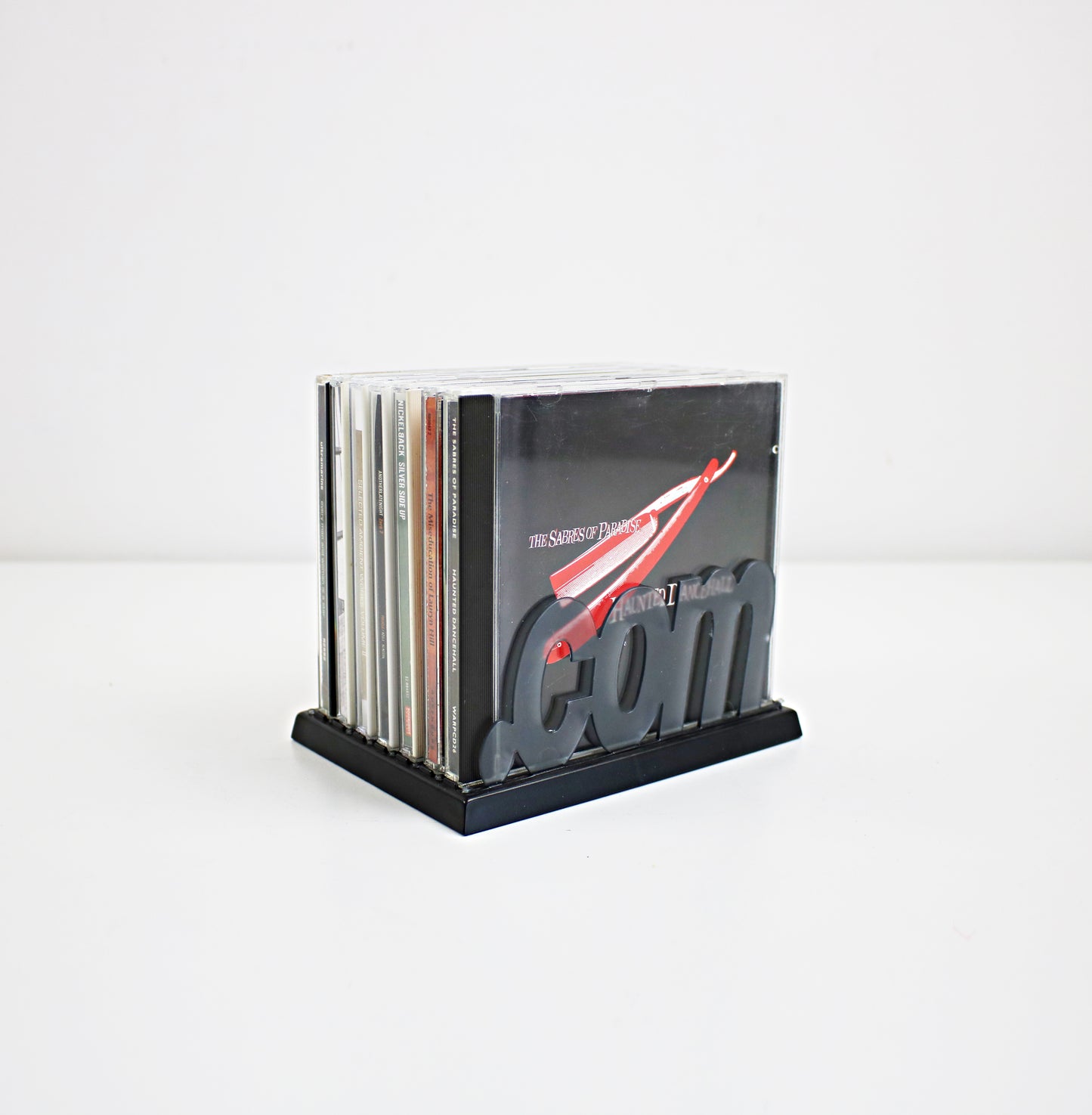 Rare .COM (dot com) CD rack from the late 90s/early 2000s