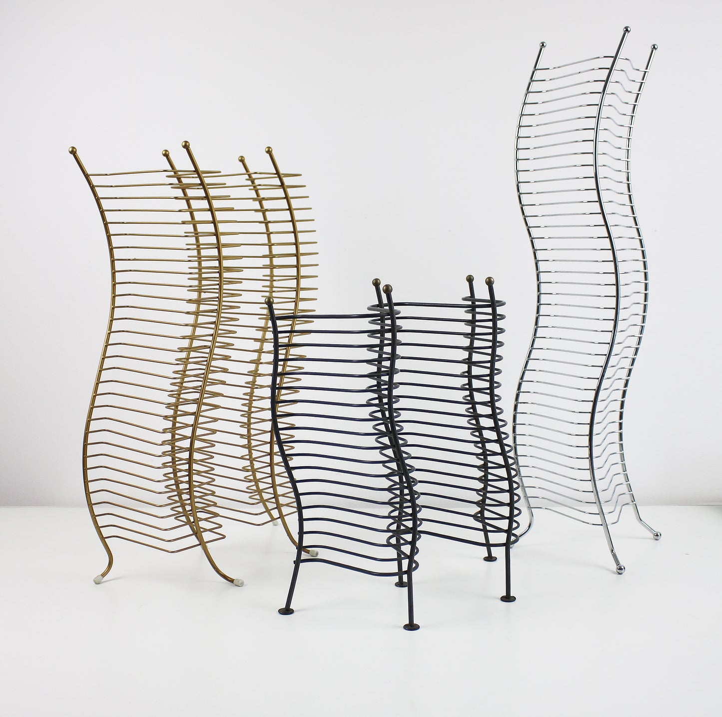 Postmodern gold finish wavy CD storage tower - 60 CDs
