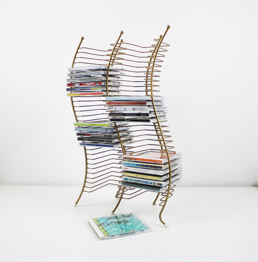 Postmodern gold finish wavy CD storage tower - 60 CDs