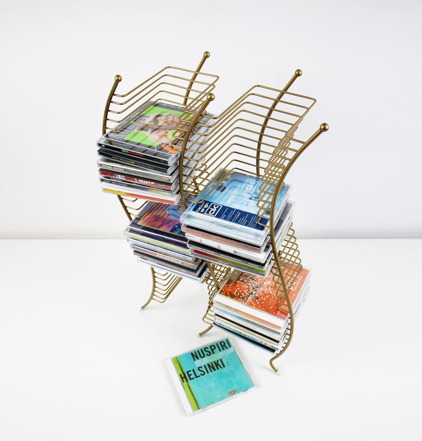 Postmodern gold finish wavy CD storage tower - 60 CDs