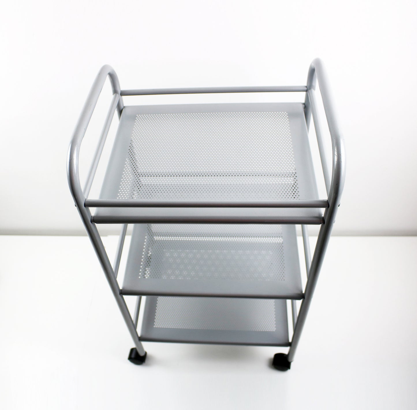 Perforated and tubular metal trolley by Hagberg and Hagberg for IKEA Preloved and retired.