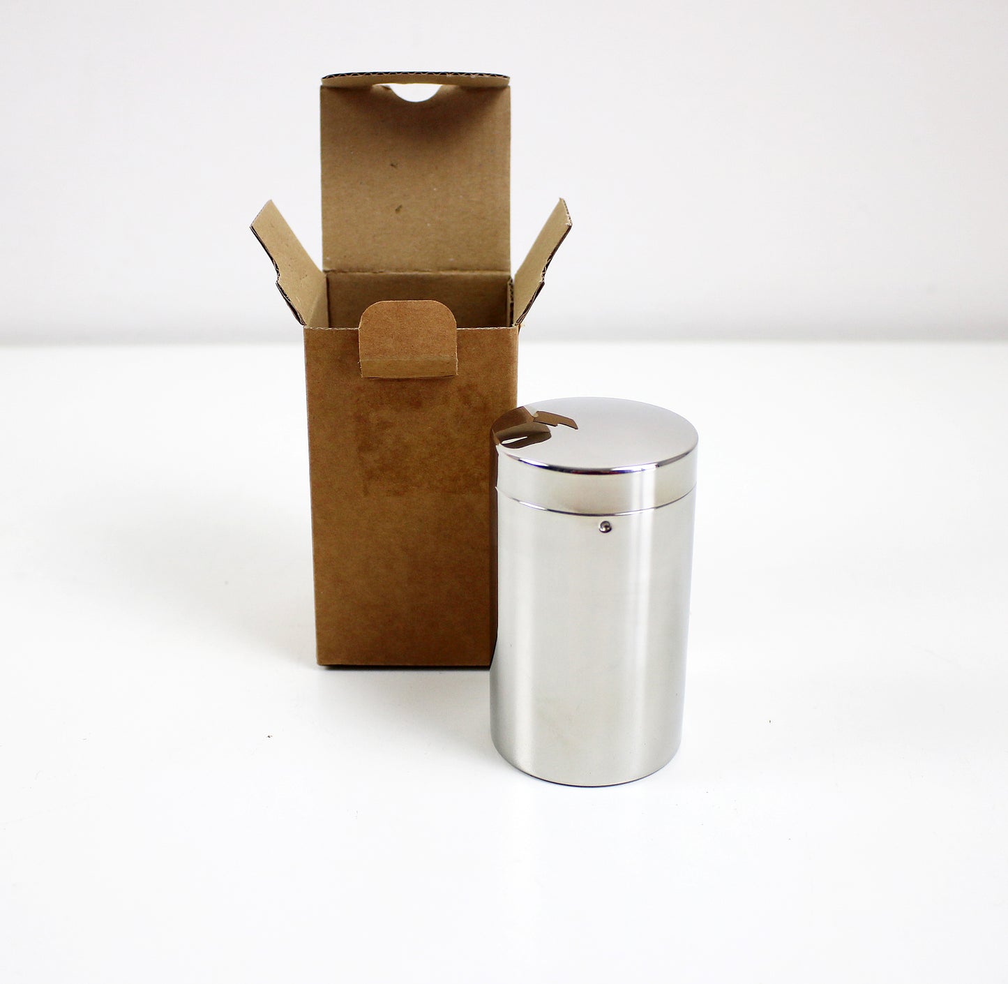 Small sugar / cocoa shaker by Carlo Alessi 1952 design. Retired re-issue unused