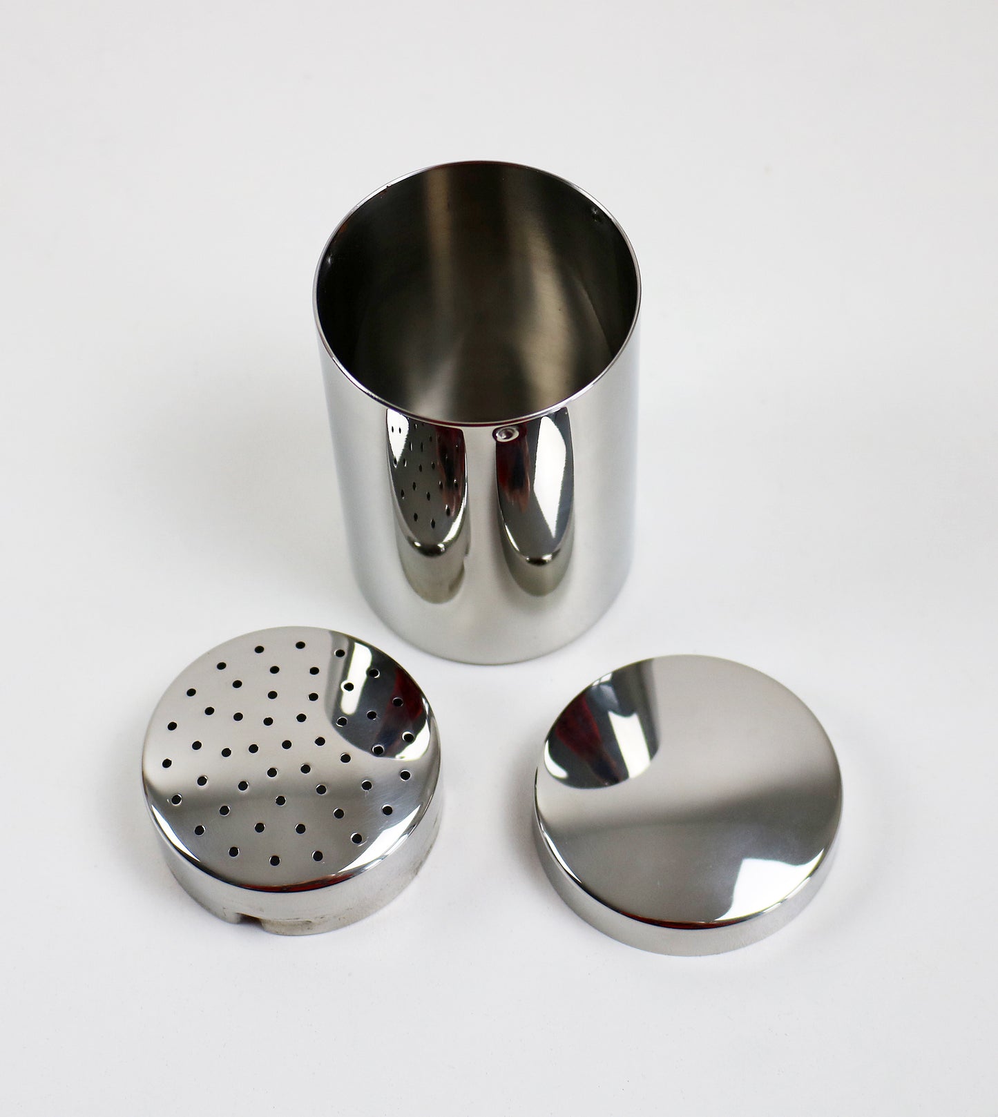 Small sugar / cocoa shaker by Carlo Alessi 1952 design. Retired re-issue unused