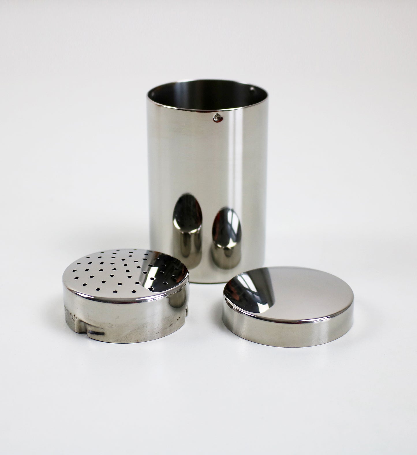 Small sugar / cocoa shaker by Carlo Alessi 1952 design. Retired re-issue unused