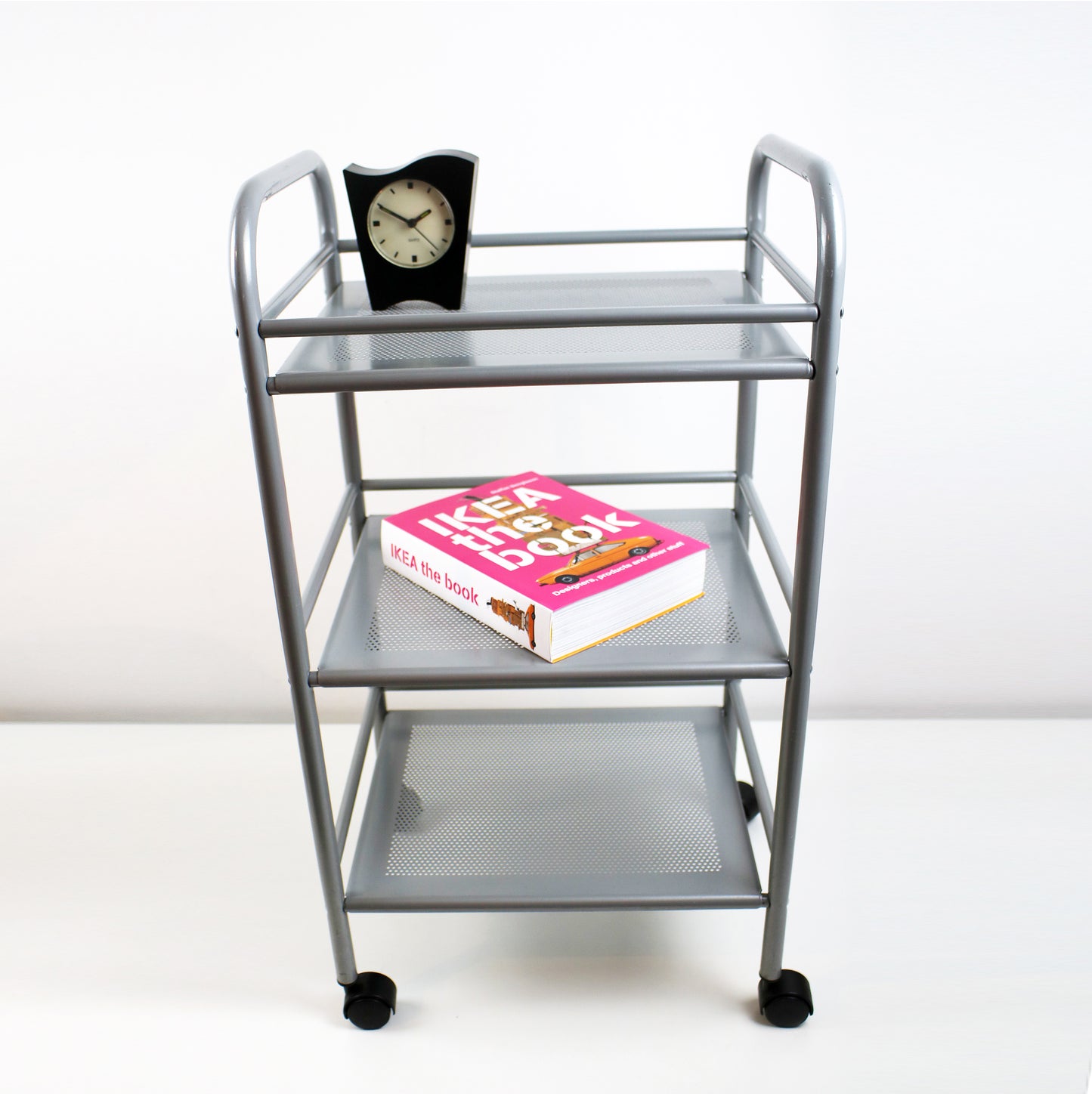Perforated and tubular metal trolley by Hagberg and Hagberg for IKEA Preloved and retired.