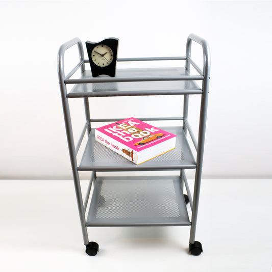 Perforated and tubular metal trolley by Hagberg and Hagberg for IKEA Preloved and retired.