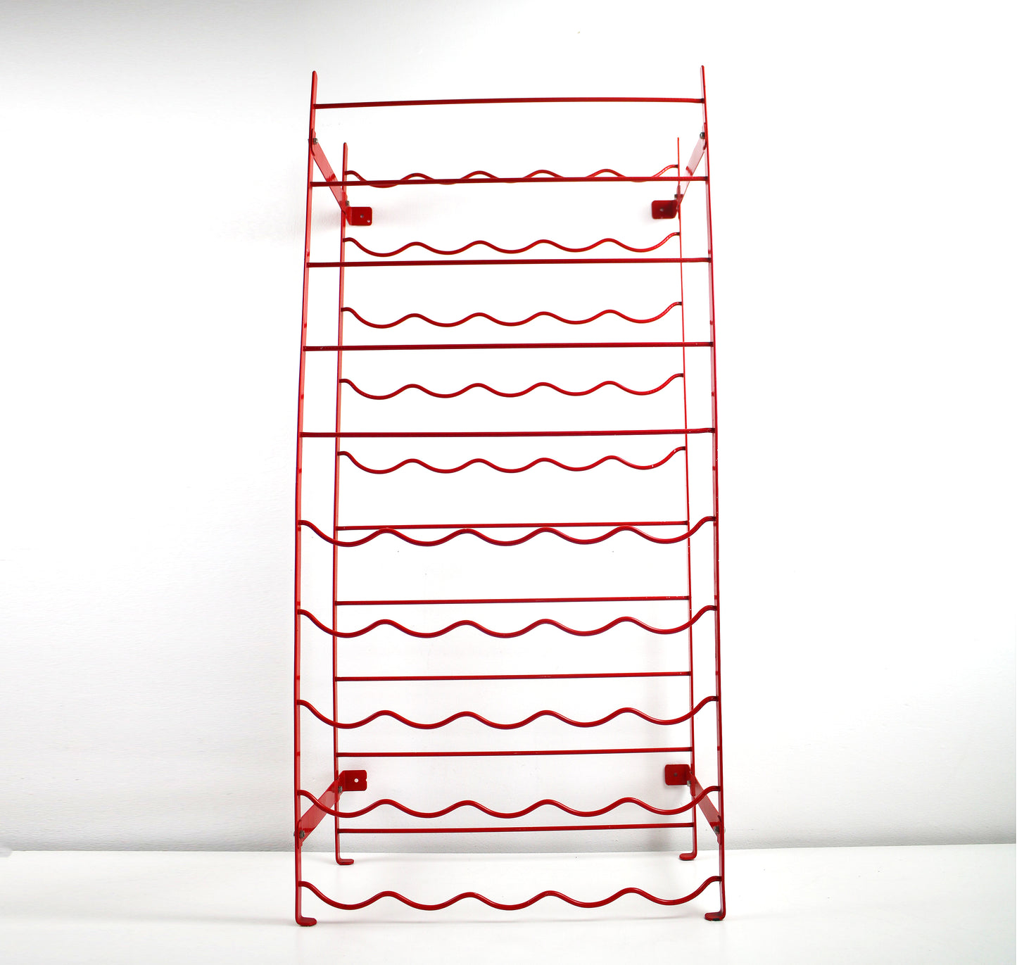 Original 1980s red metal wire wine rack by Herby for Habitat