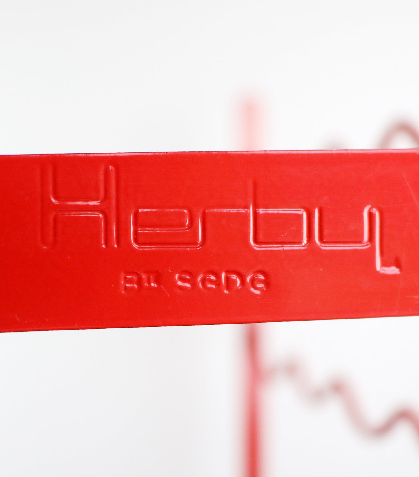 Original 1980s red metal wire wine rack by Herby for Habitat