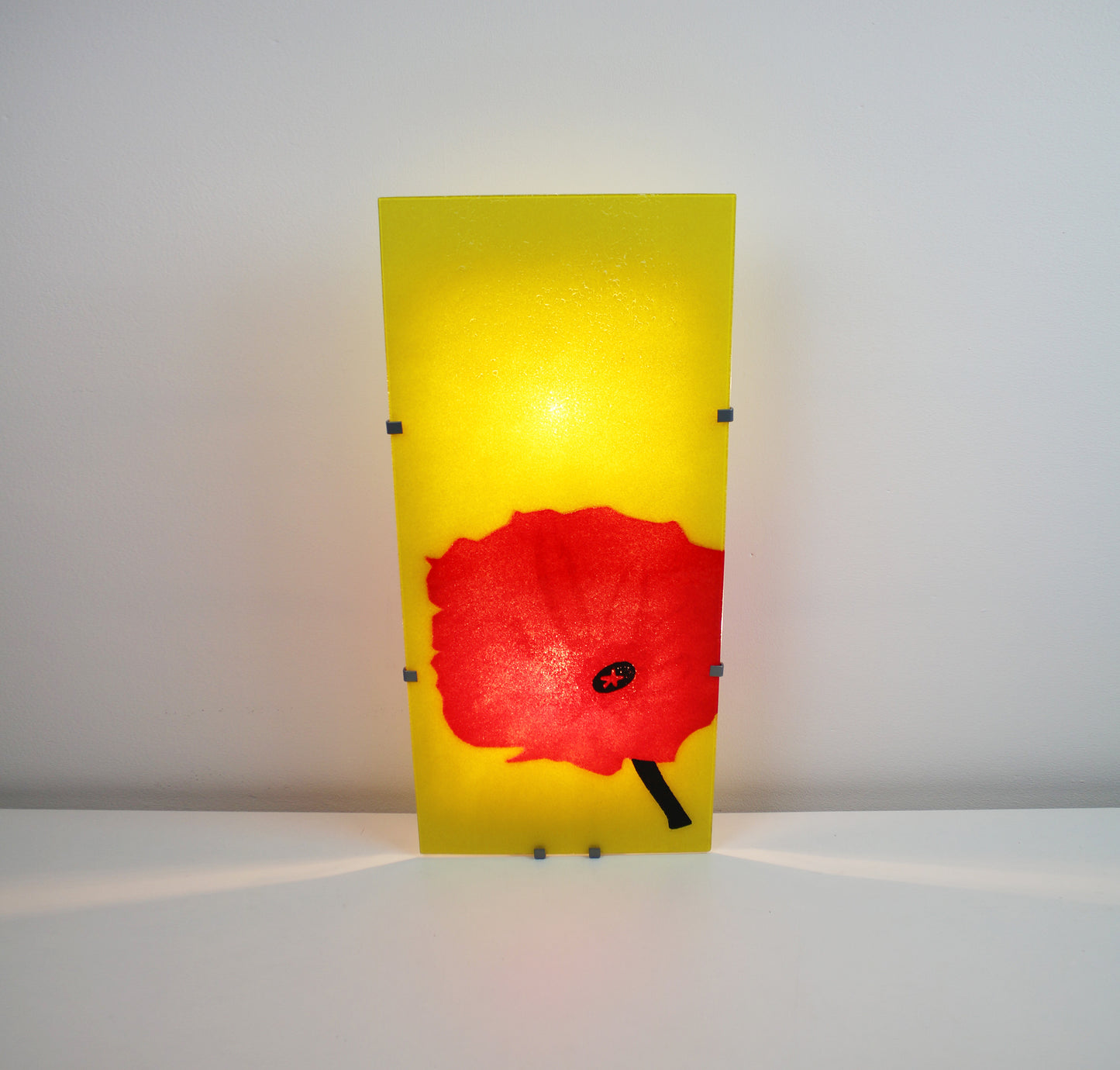 Gyllen by IKEA retired wall light with glass art panel 2006 by David Wahl