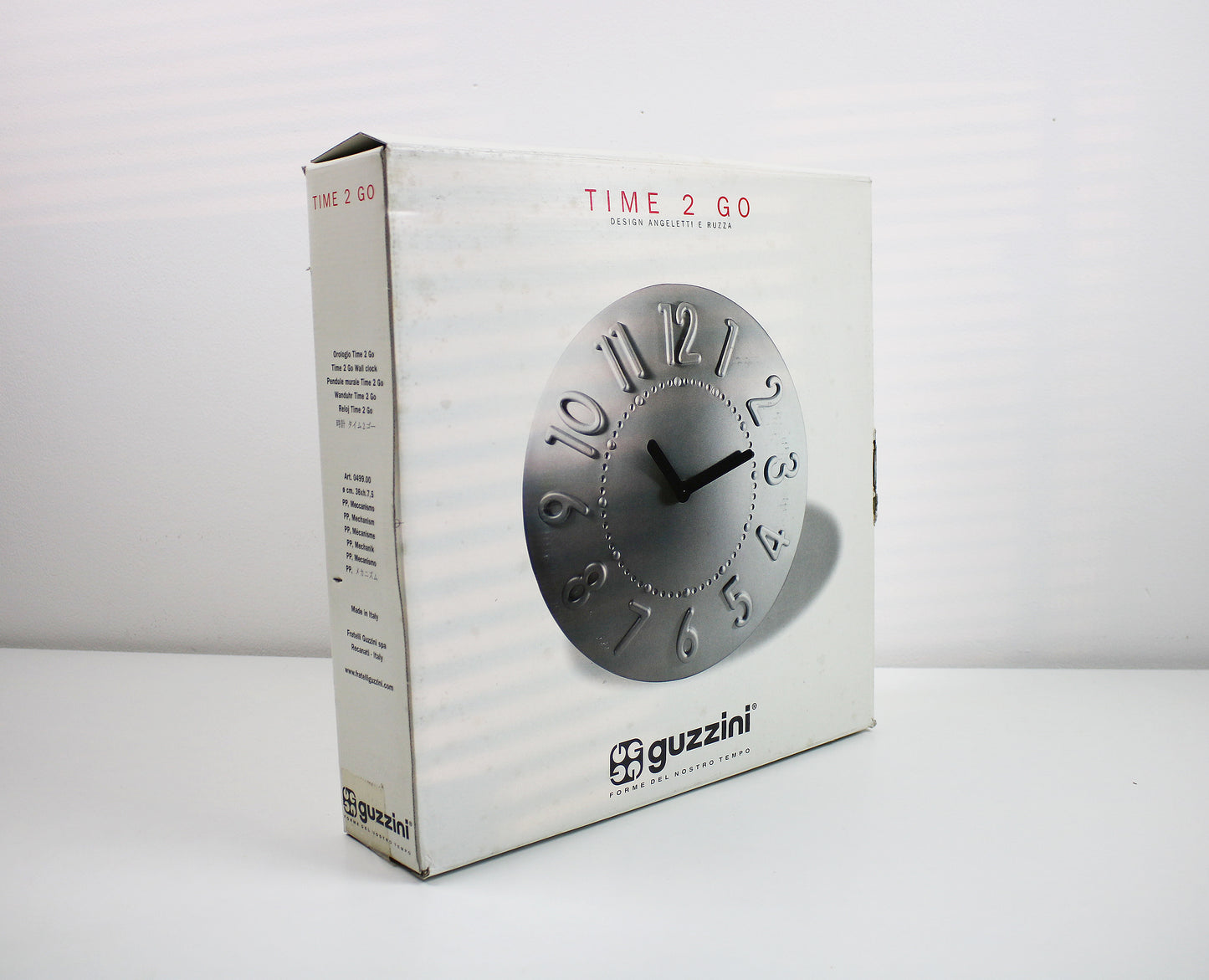 Rare Y2K space age wall clock by Angletti E Ruzza for Guzzini Time 2 Go acrylic wall clock in silver grey - space age aesthetic