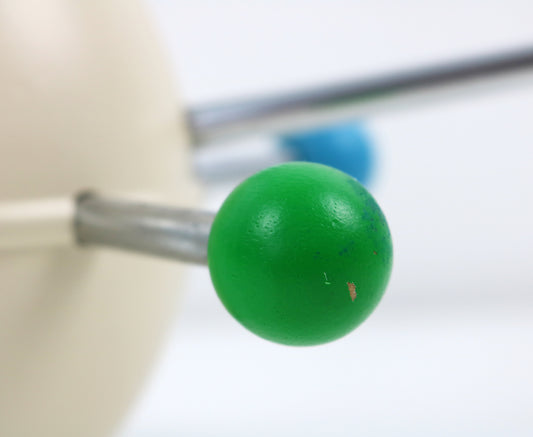 Early 2000s Saturnus coat hanger from Present Time. Preloved