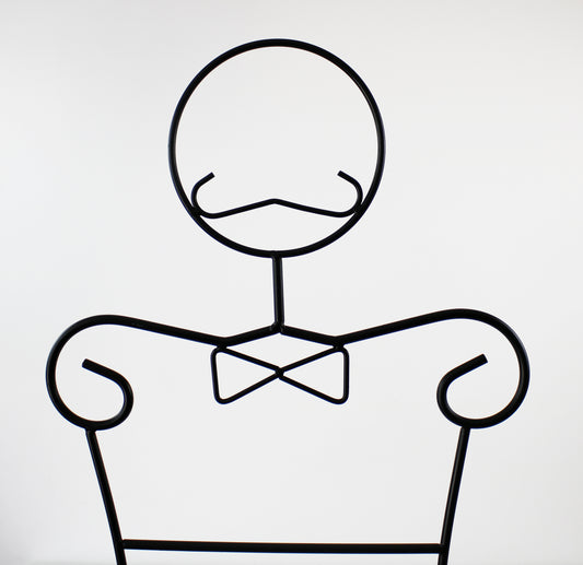 Vintage black metal gentleman valet