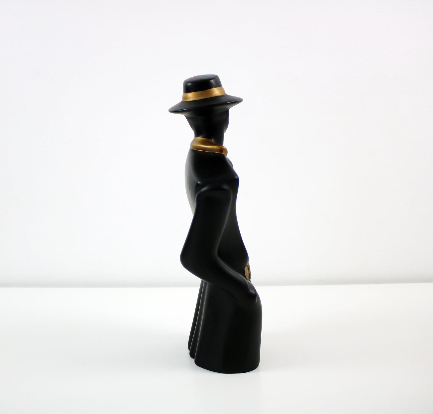 Figurine statuette in black and gold 1980s post modern art deco revival