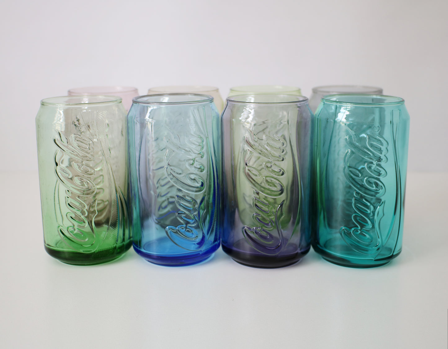 Set of Coca Cola can glasses in 8 colours - early 21st Century McDonalds