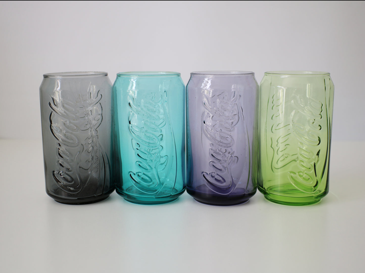 Set of Coca Cola can glasses in 8 colours - early 21st Century McDonalds