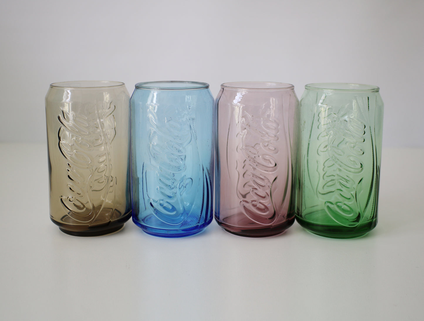 Set of Coca Cola can glasses in 8 colours - early 21st Century McDonalds