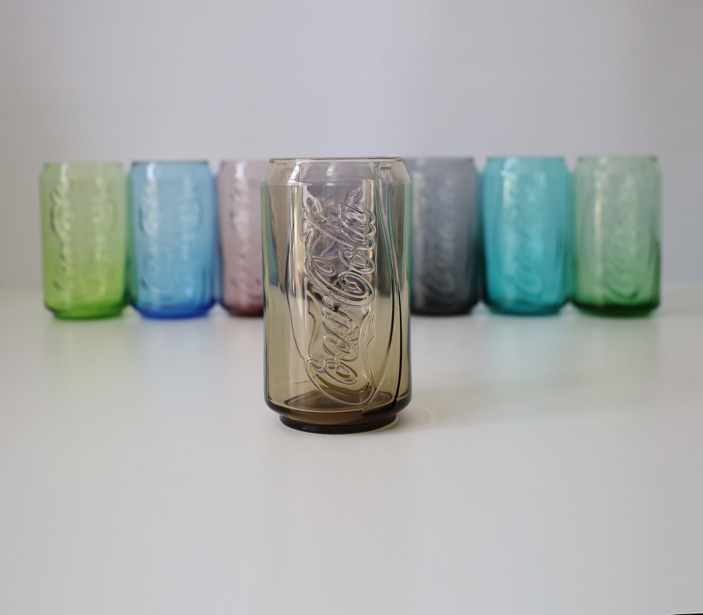 Set of Coca Cola can glasses in 8 colours - early 21st Century McDonalds