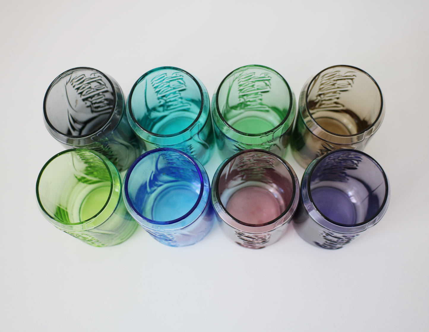 Set of Coca Cola can glasses in 8 colours - early 21st Century McDonalds