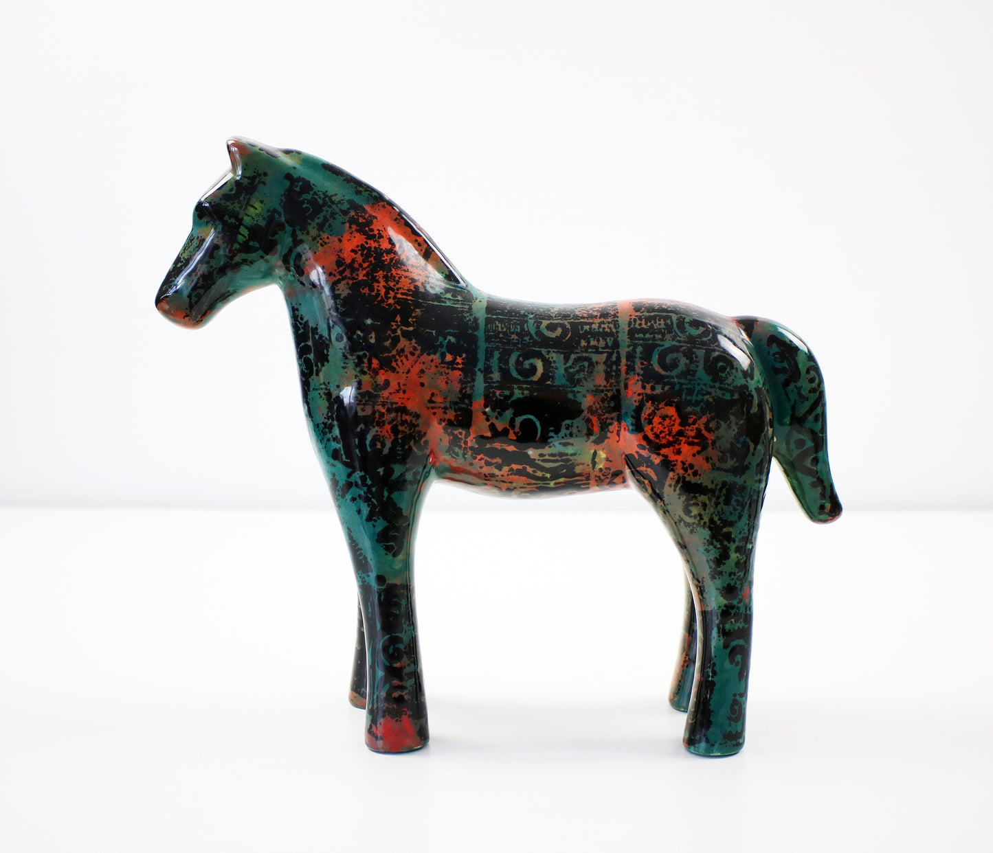Aztec pattern glazed ceramic horses - hand decorated and signed JM Mayco 2006