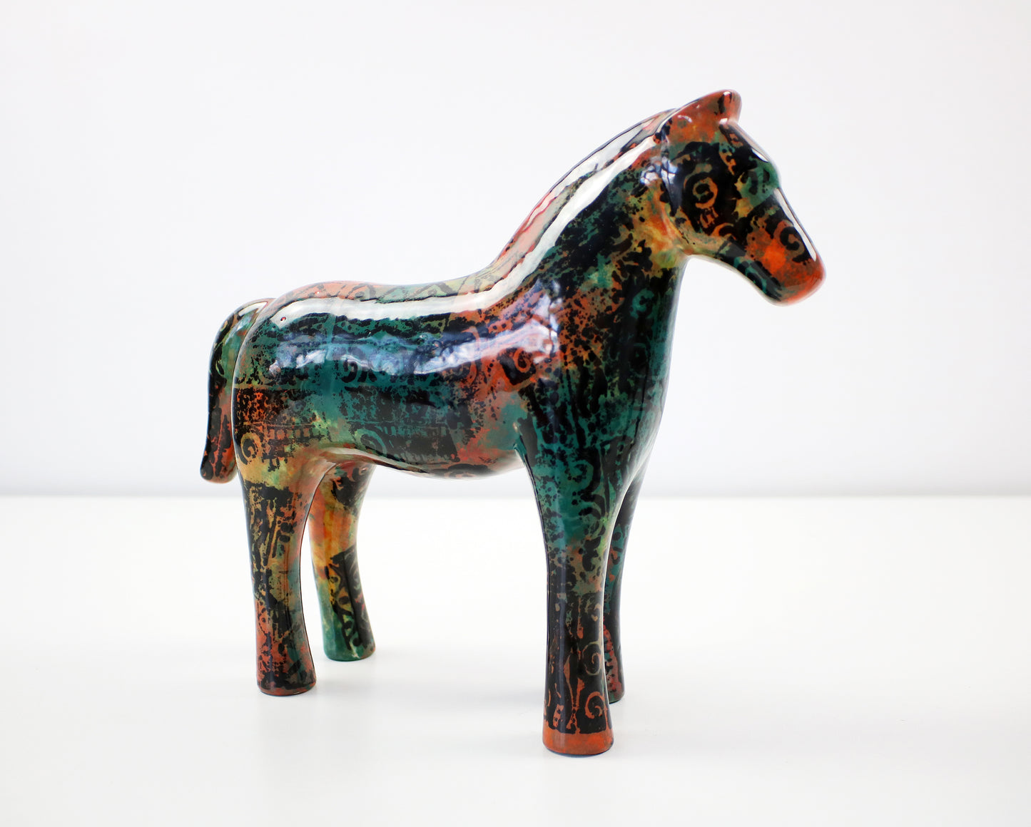 Aztec pattern glazed ceramic horses - hand decorated and signed JM Mayco 2006