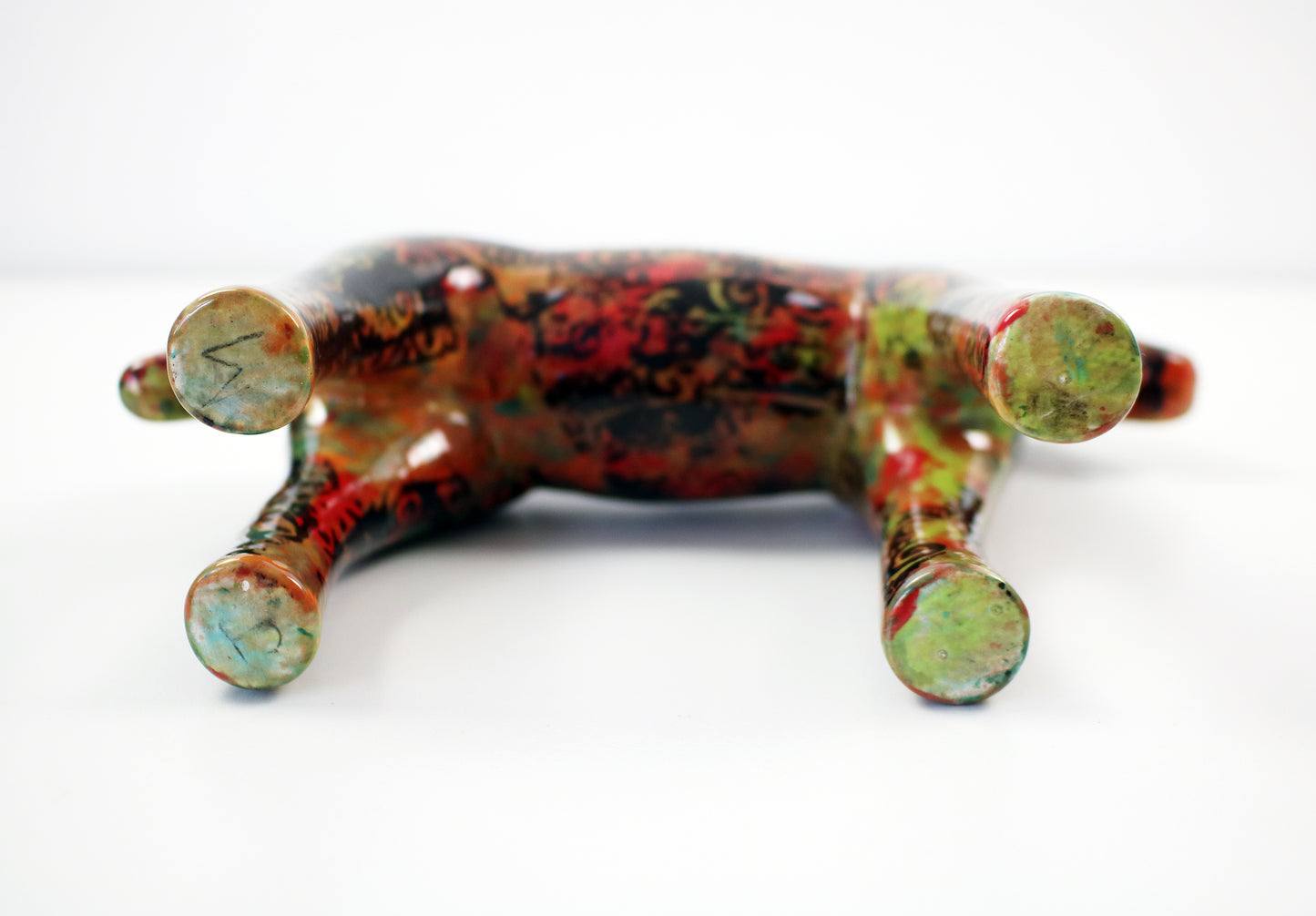 Aztec pattern glazed ceramic horses - hand decorated and signed JM Mayco 2006