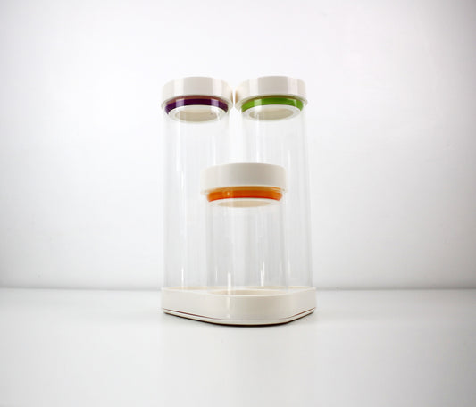 Joseph Joseph glass and plastic container set on swivel base preloved