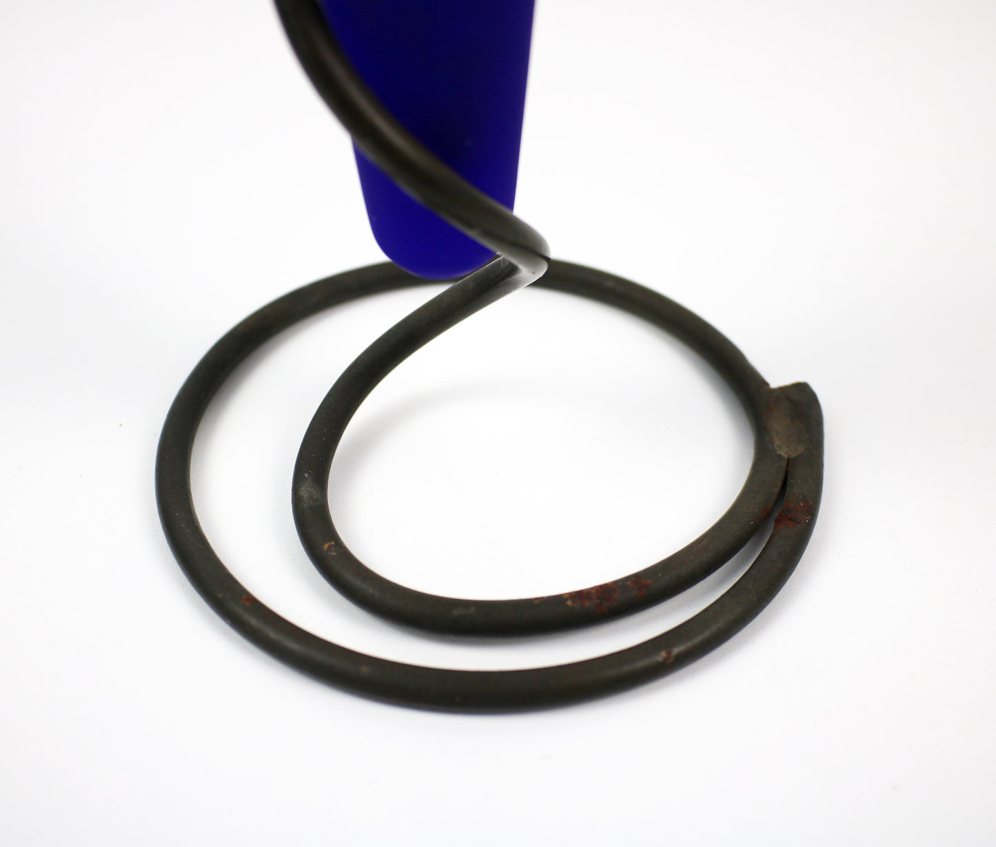 Deep blue glass cone vase in metal spiral holder - 24cm
