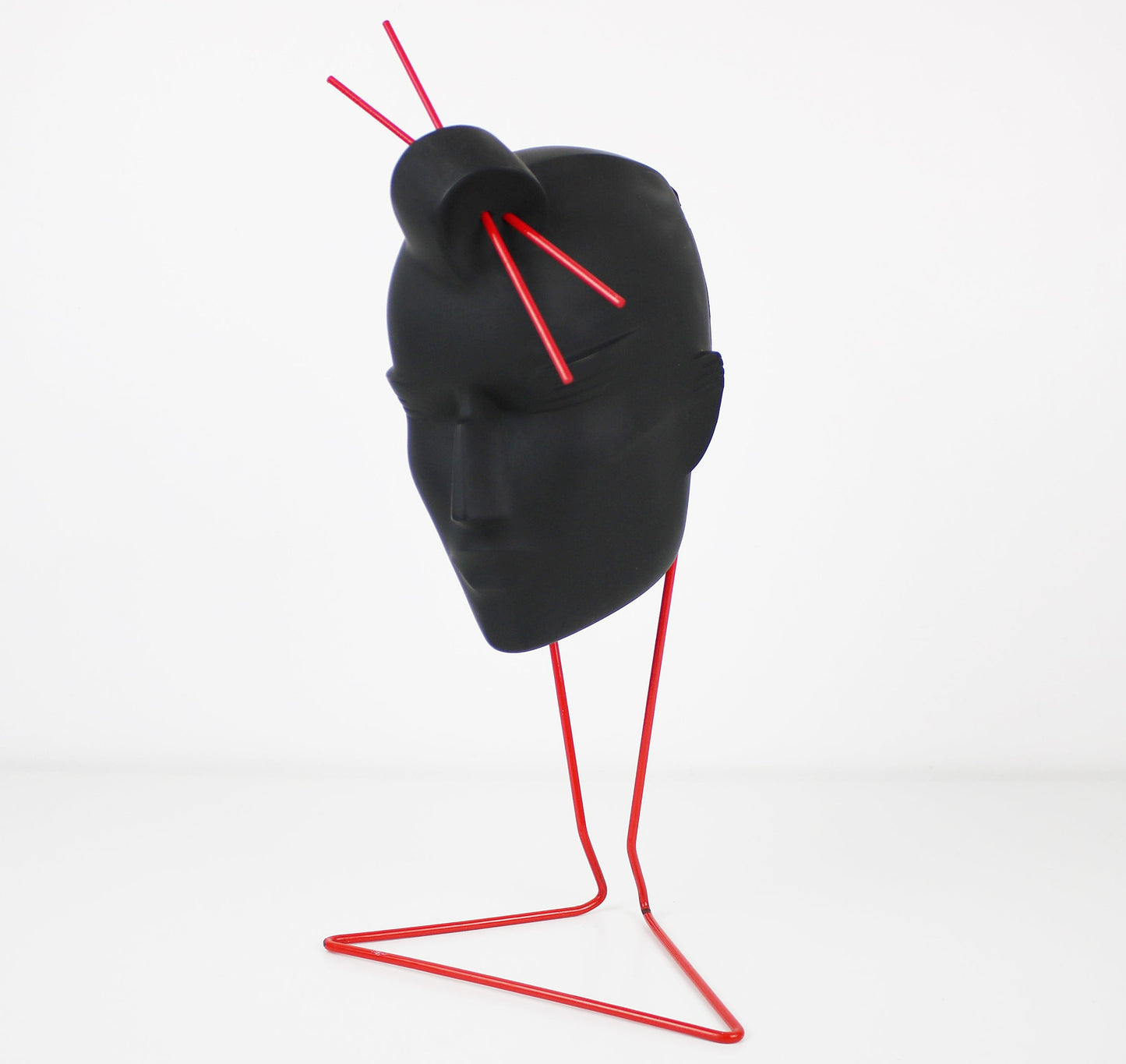 Original Lindsey B Stix resin sculpture in black on red metal stand
