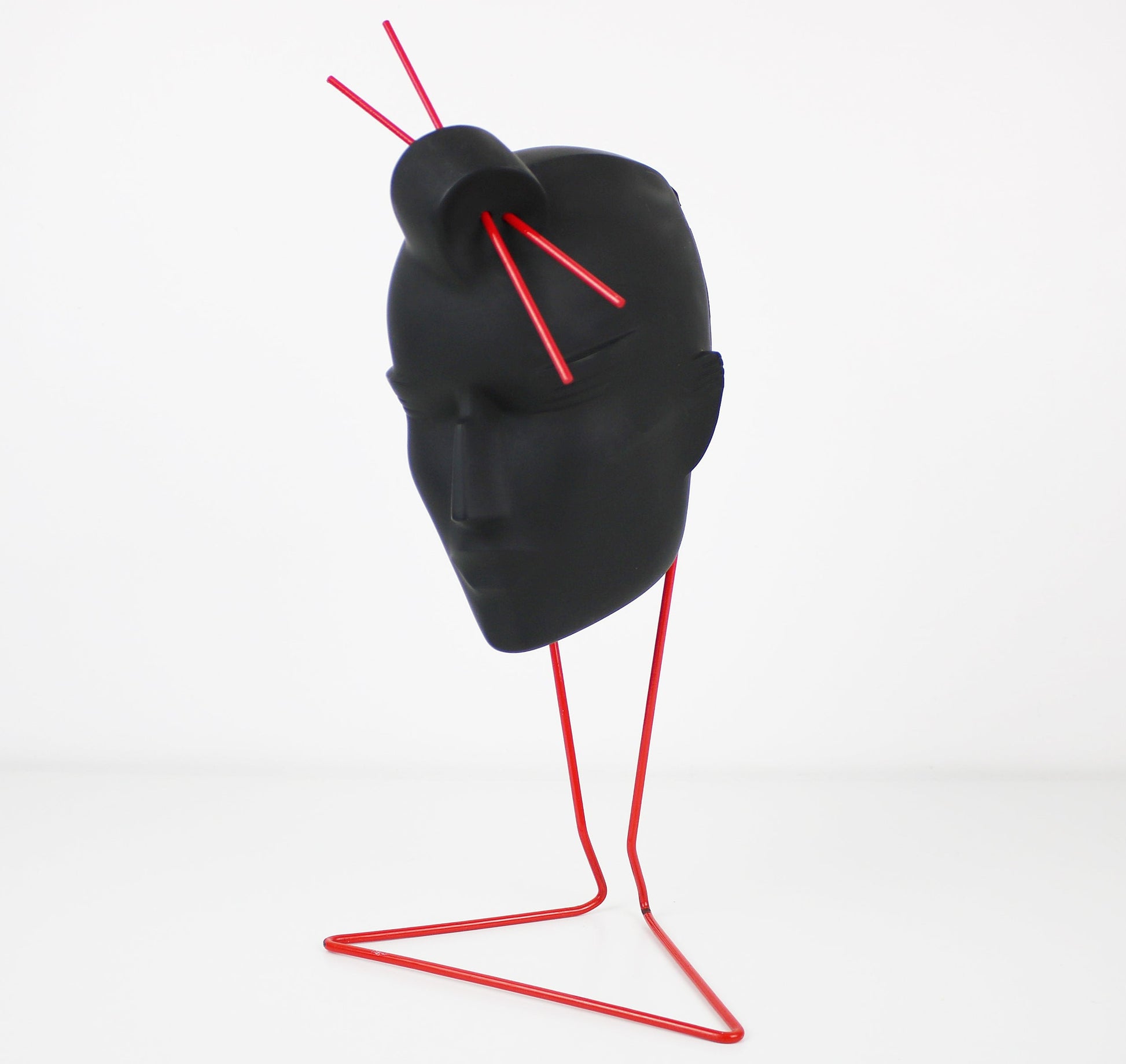 Original Lindsey B Stix resin sculpture in black on red metal stand