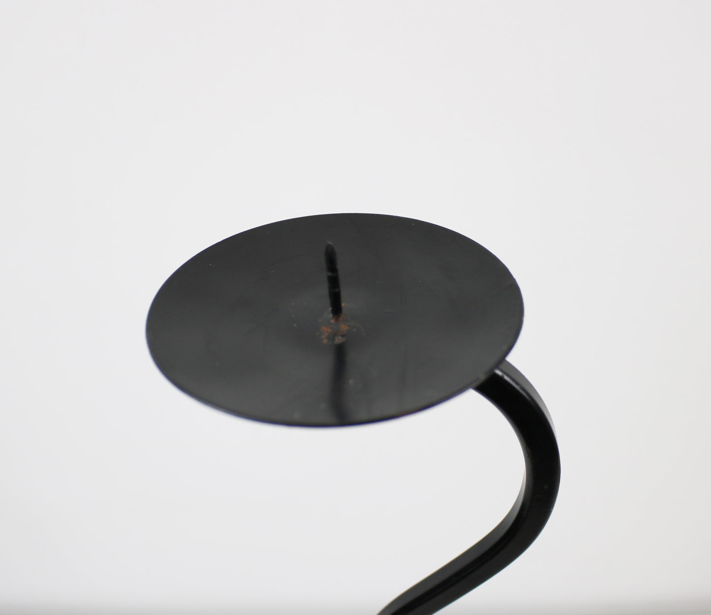 Pair of post modern floor standing wave squiggle iron candlesticks