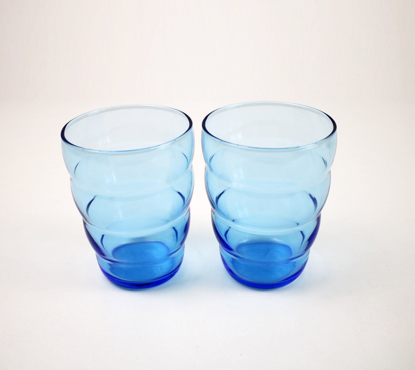 Pairs of retired and preloved Skoja beehive glasses by IKEA 2012