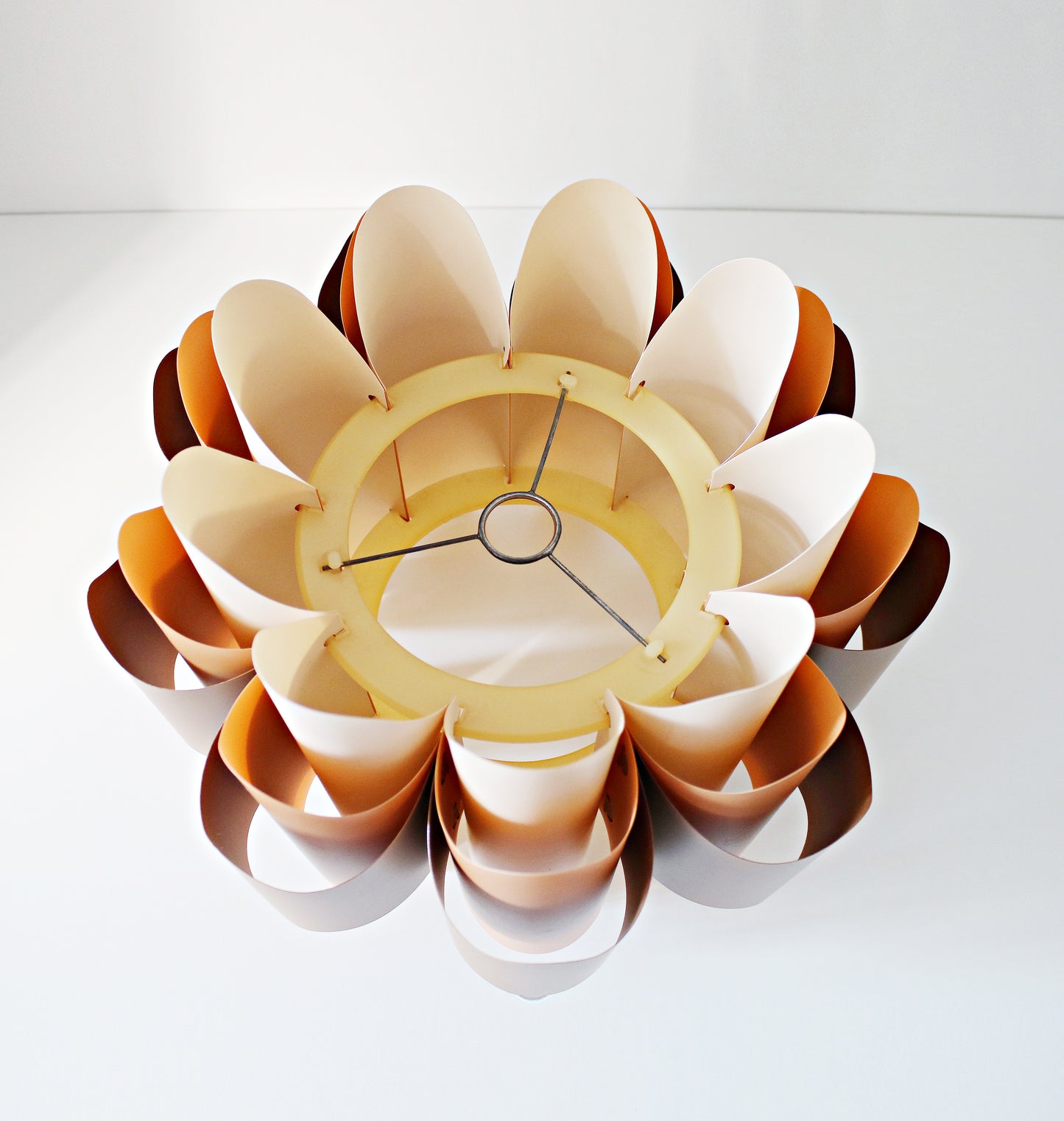Rare 1970s ceiling lamp shade in (Hoyrup) tones of orange, brown and cream. Geometric modernist design in plastic