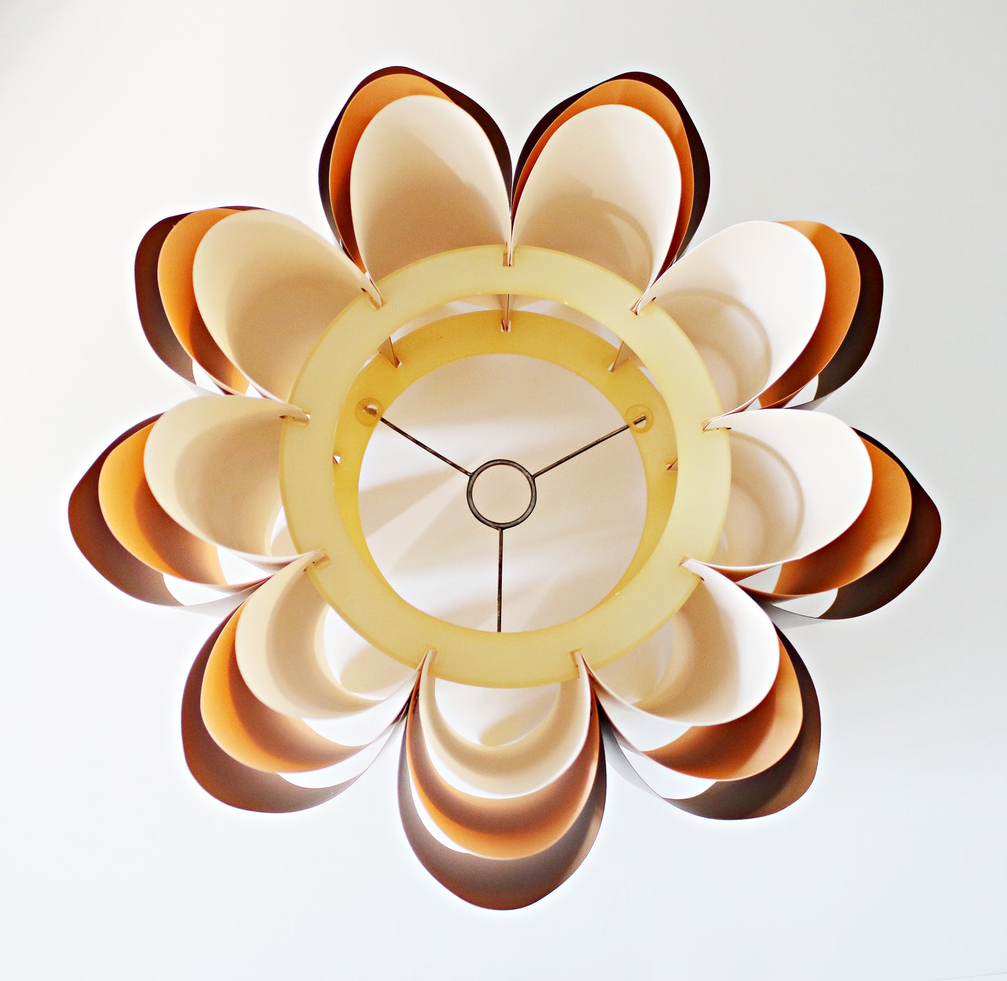 Rare 1970s ceiling lamp shade in (Hoyrup) tones of orange, brown and cream. Geometric modernist design in plastic