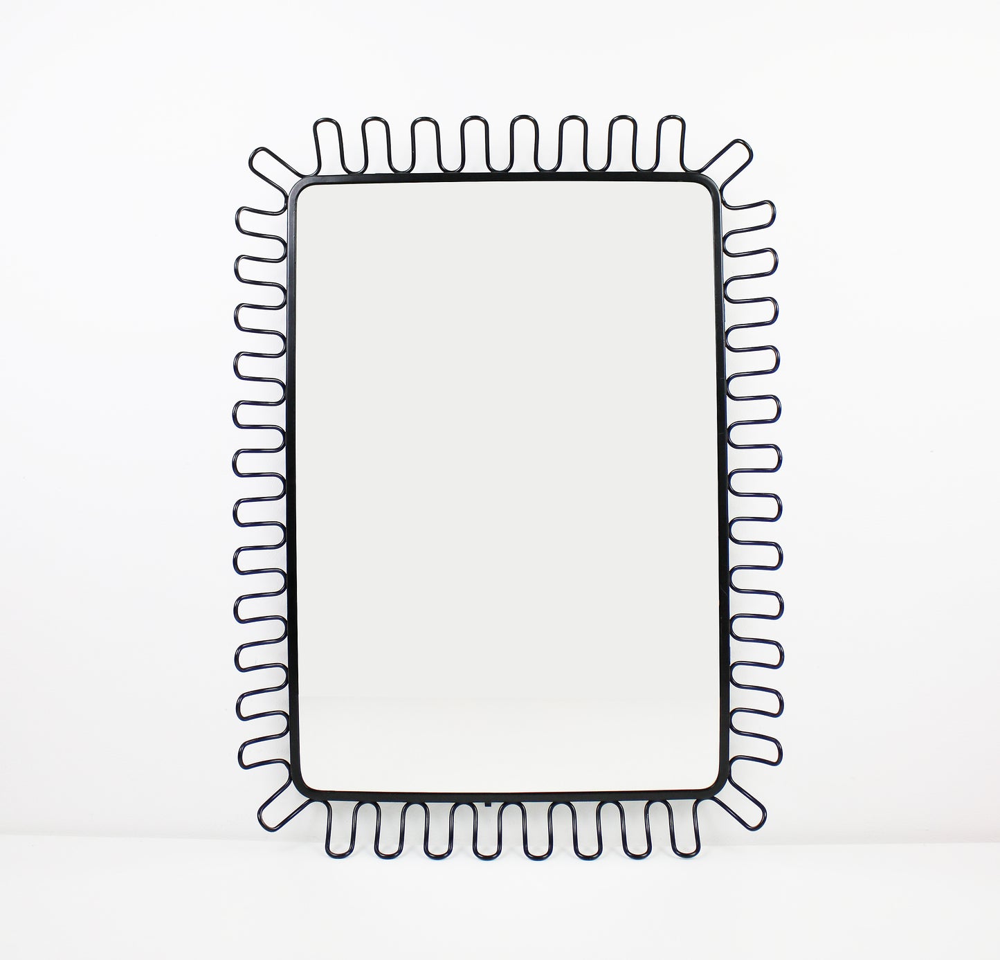 black metal framed wavy mirror by Ikea 2008 mandal
