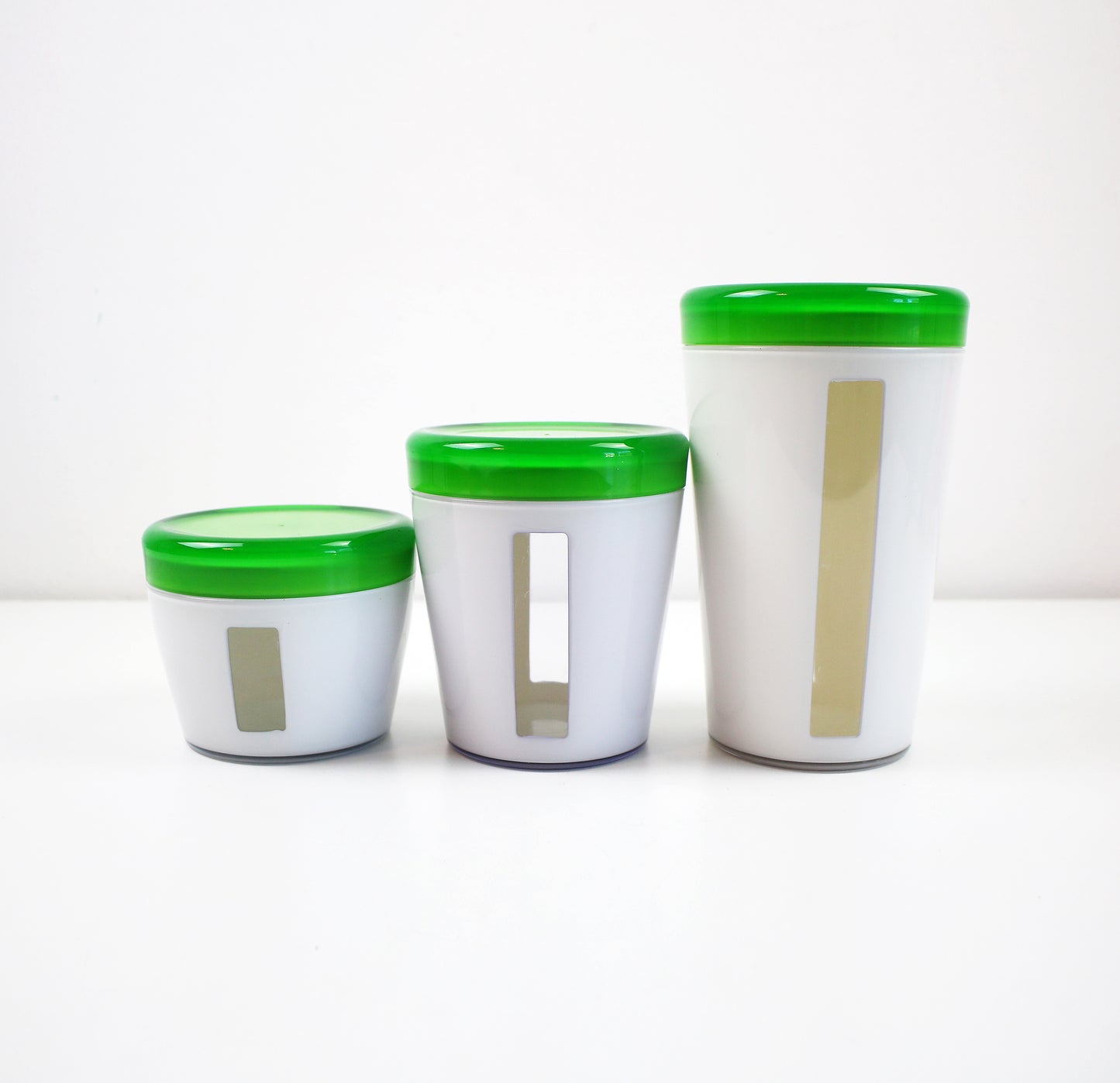 Preloved Italian acrylic canister set by Omada in green and white