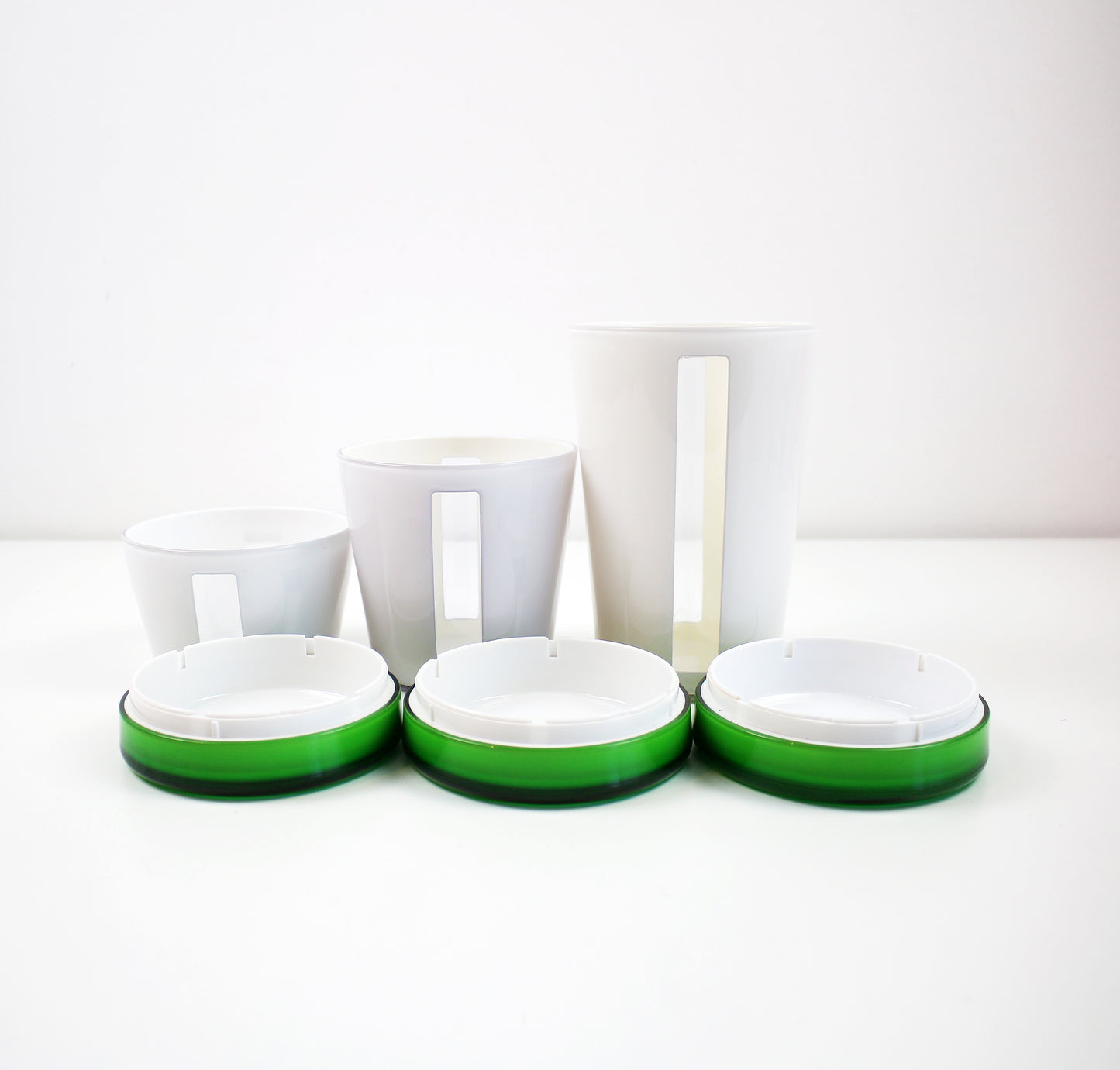 Preloved Italian acrylic canister set by Omada in green and white