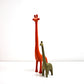 orange and bronze giraffe ornaments from habitat and ikea collectable metal and enamel figurines
