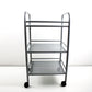 Perforated and tubular metal trolley by Hagberg and Hagberg for IKEA Preloved and retired.