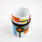 Unused, boxed Po ring mug designed by Debora Jedwab - retired pattern