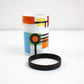 Unused, boxed Po ring mug designed by Debora Jedwab - retired pattern