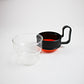 Pairs of modernist Pyrex Brasilia - glass and plastic cups - black and orange or black and yellow